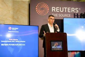 Event photography Singapore coverage of speaker talking for Reuters: future outlook Asia