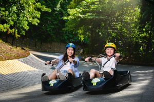 Family lifestyle photography at Skyline Luge Singapore attraction in Sentosa