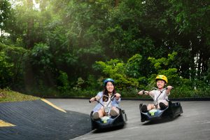Family lifestyle photography at Skyline Luge Singapore attraction in Sentosa