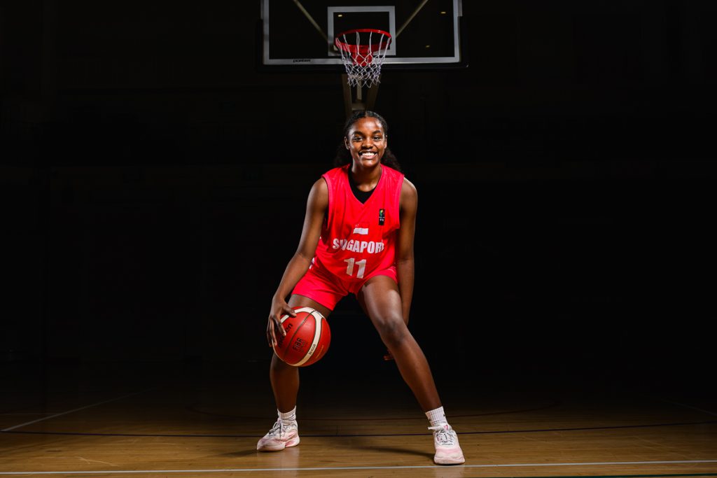 basketball athlete portrait with dramatic low key lighting