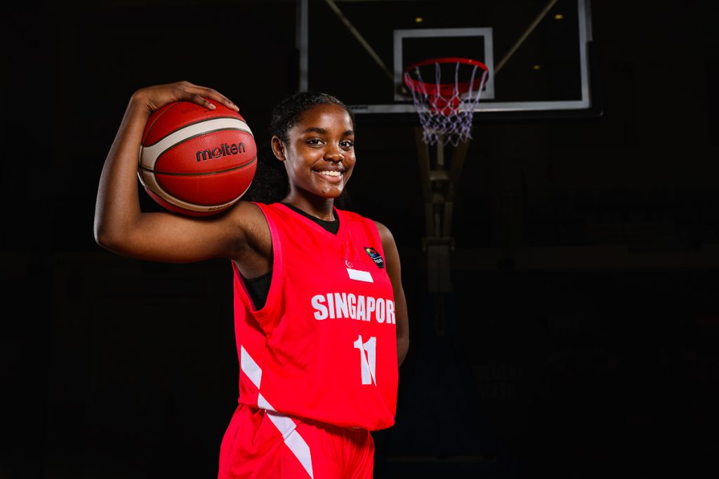 low key basketball portrait of athlete holding ball Singapore