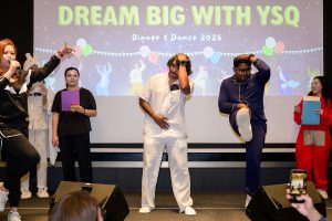 Live performance captured during a corporate Dinner & Dance, showcasing entertainment and event energy.
