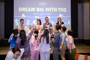 employee receiving award on stage during corporate dinner and dance event singapore