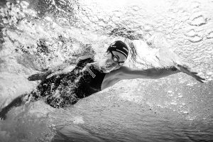 Singapore swimmer Quah Ting Wen performing freestyle underwater during a commercial sports photography session.