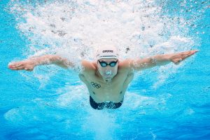 Singapore swimmer Quah Zheng Wen performing butterfly underwater during a commercial sports photography session.