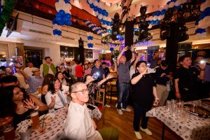 Employees enjoying stage entertainment at Rolls-Royce Oktoberfest 2026