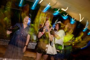 Creative slow-shutter photograph of the Rolls-Royce Oktoberfest party atmosphere